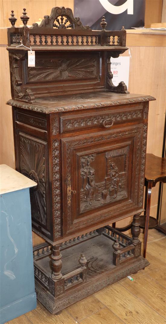 An oak Flemish cabinet W.71cm